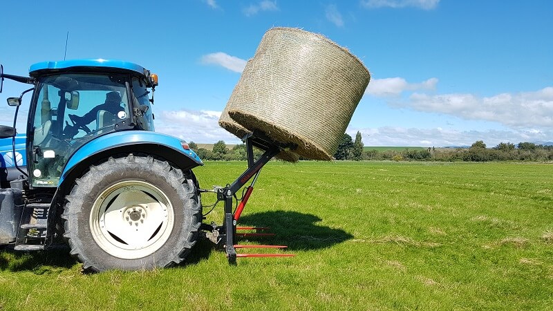Rata Equipment Hay Hauler loading the top bales