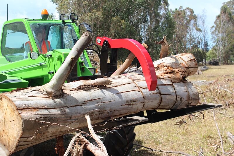 Log fork picking up an old tree on Merlo Telehandler