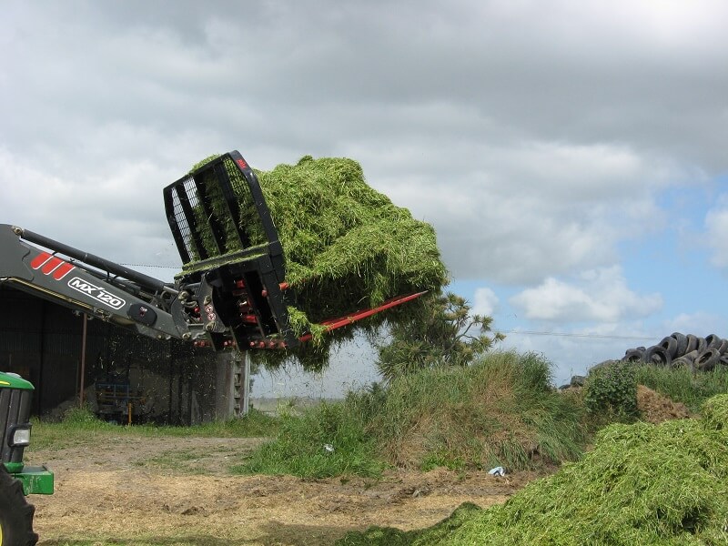 Push Off Buck Rake with a load of silage