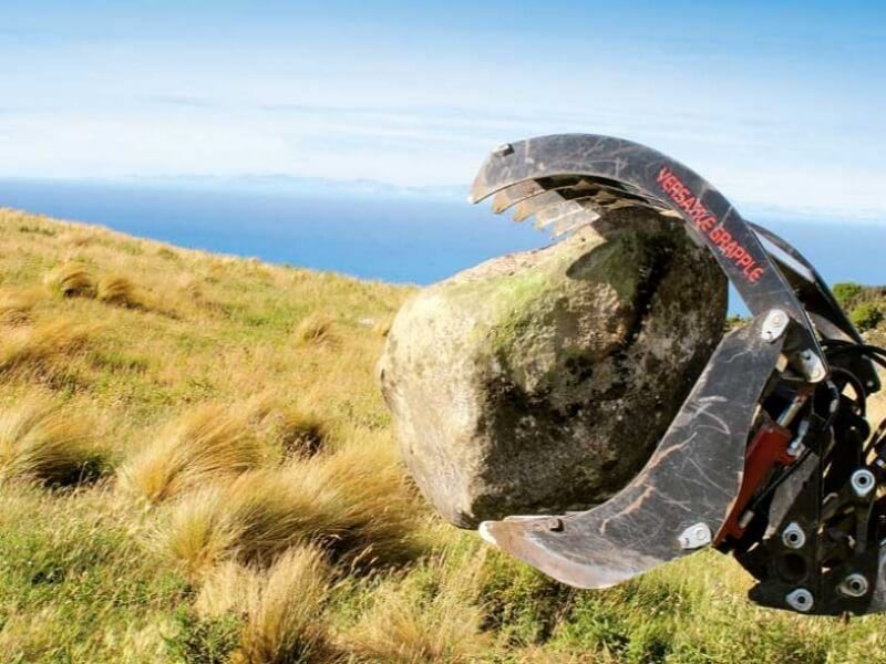 Versatile Grapple handling rock boulders