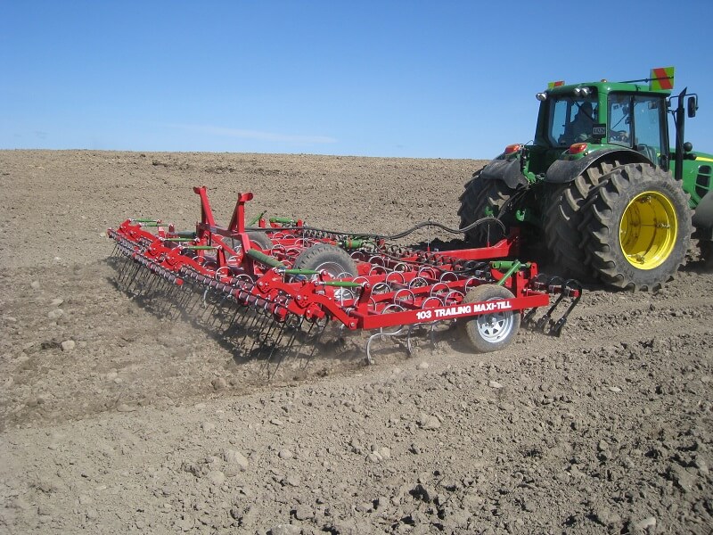 103 Trailing Maxitill behind john deere with levelling boards and finger tines