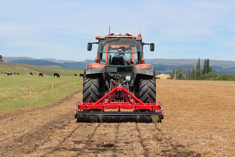 subsoil aerating a dry paddock suffering from soil compaction during a dry summer