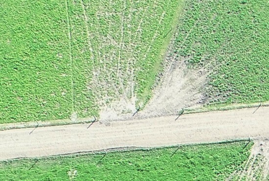 Farm lane way and gates from above