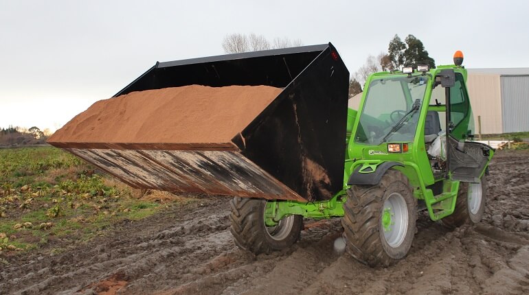 Bucket handling palm kernel